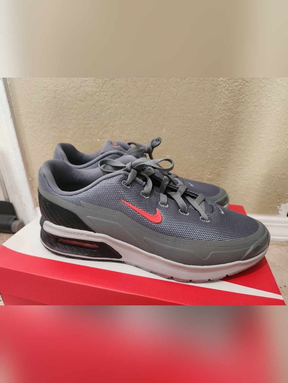 Nike Men's Gray Athletic Sneakers with Red Swoosh